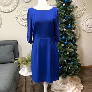 Blue dress with lots of details